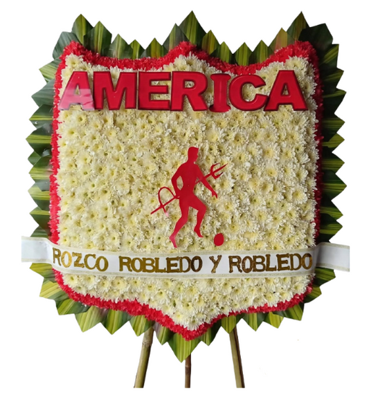 Escudo fúnebre del América de Cali elaborado con pompones blancos y rojos en trípode 🕊️❤️⚽
